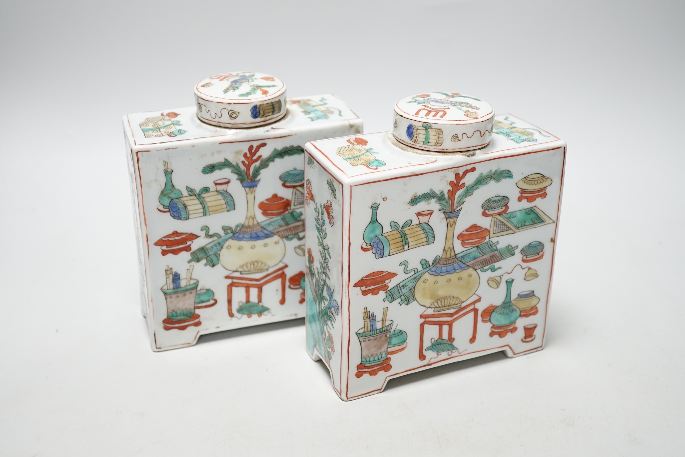 A pair of Chinese famille verte square form caddies and covers, 16cm